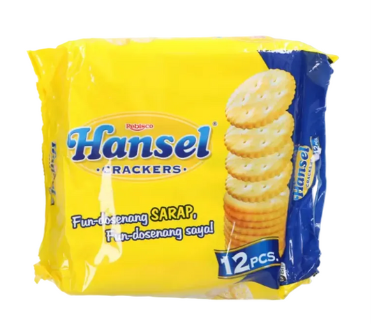A package of Hansel Crackers 12pcs. by Ingleco, featuring a bright yellow bag with a blue side panel and an illustration of round crackers, shown on a transparent background.