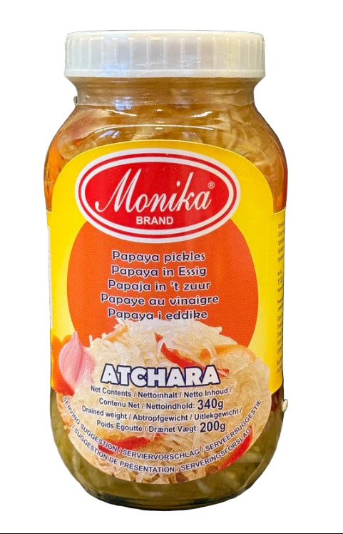 Jar of Monika brand Atchara on a dark background