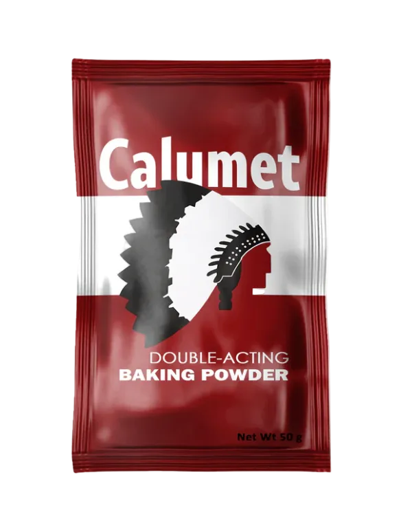 Calumet double-acting baking powder packet on a white background