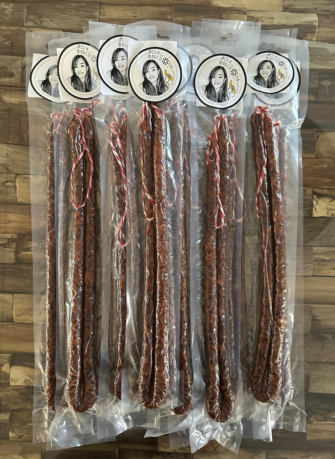 Packaged chorizito filipino sausages with brand stickers pinay sa barcelona.